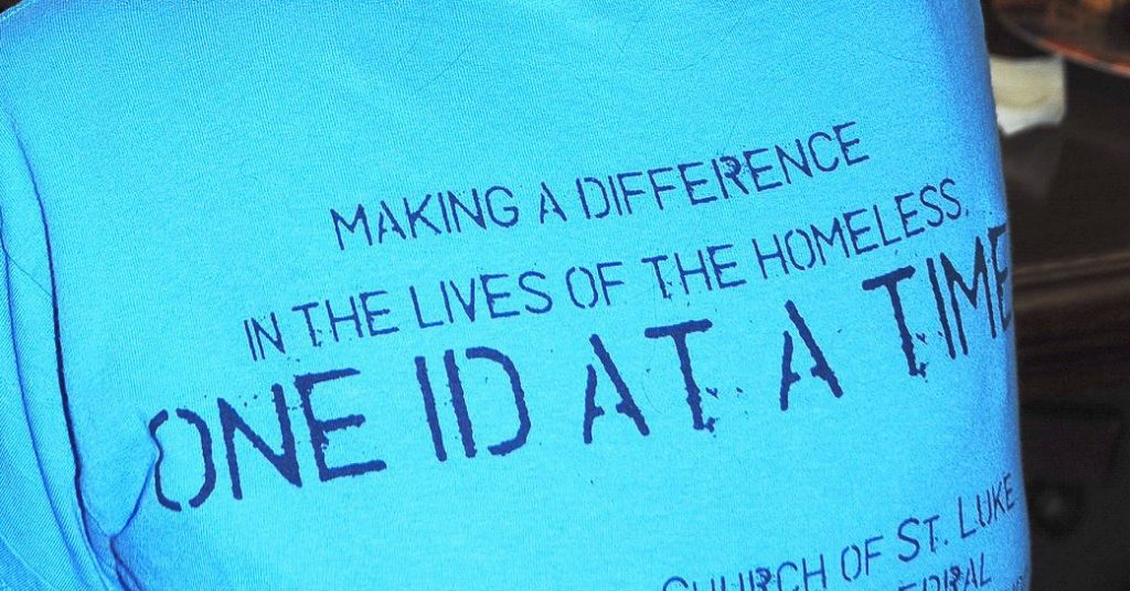 A picture of the back of the first IDignity volunteer t-shirt